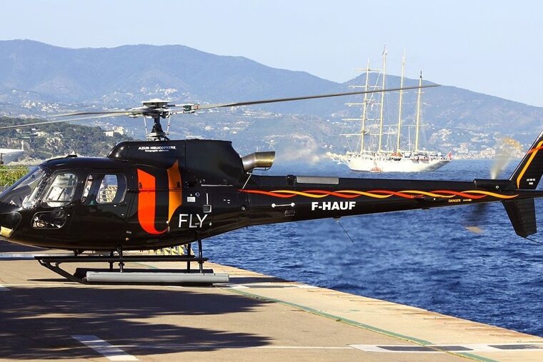 a helicopter taking off in monaco