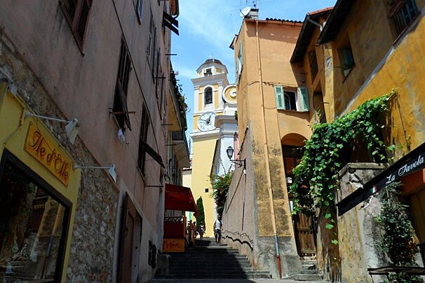 a medieval town near Nice with a clock tower